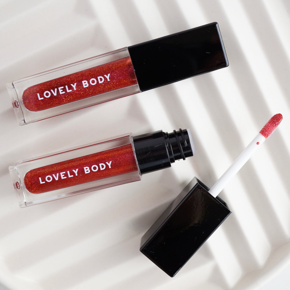 Belladonna Lip Gloss - Sheer Red Glimmer