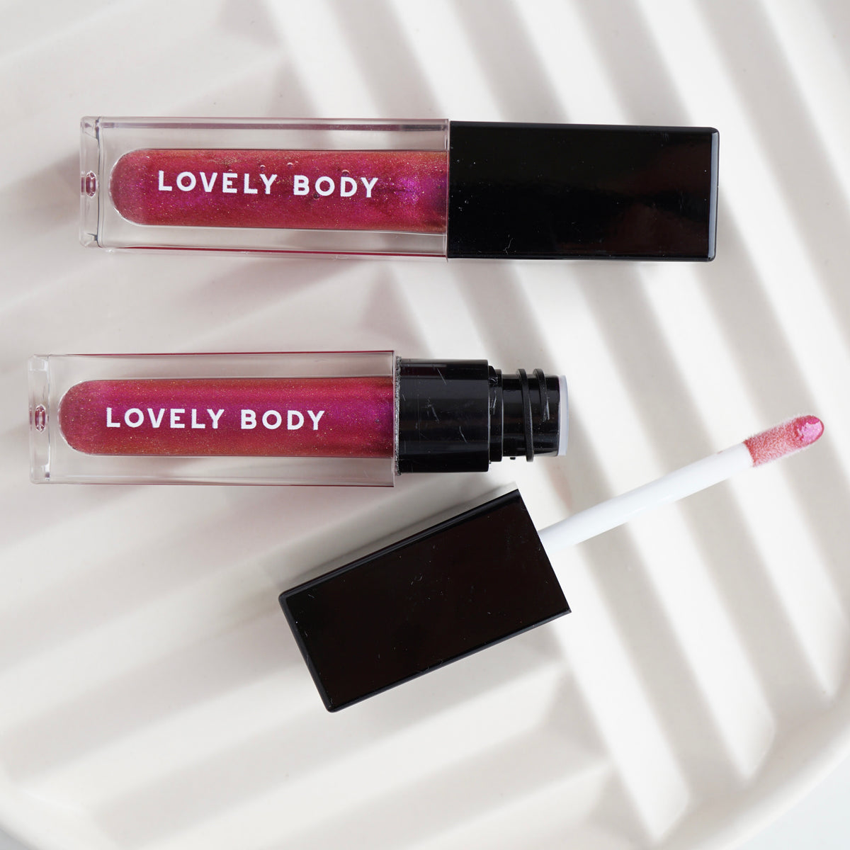 Bad Rose Lip Gloss - Sheer Violet Shine