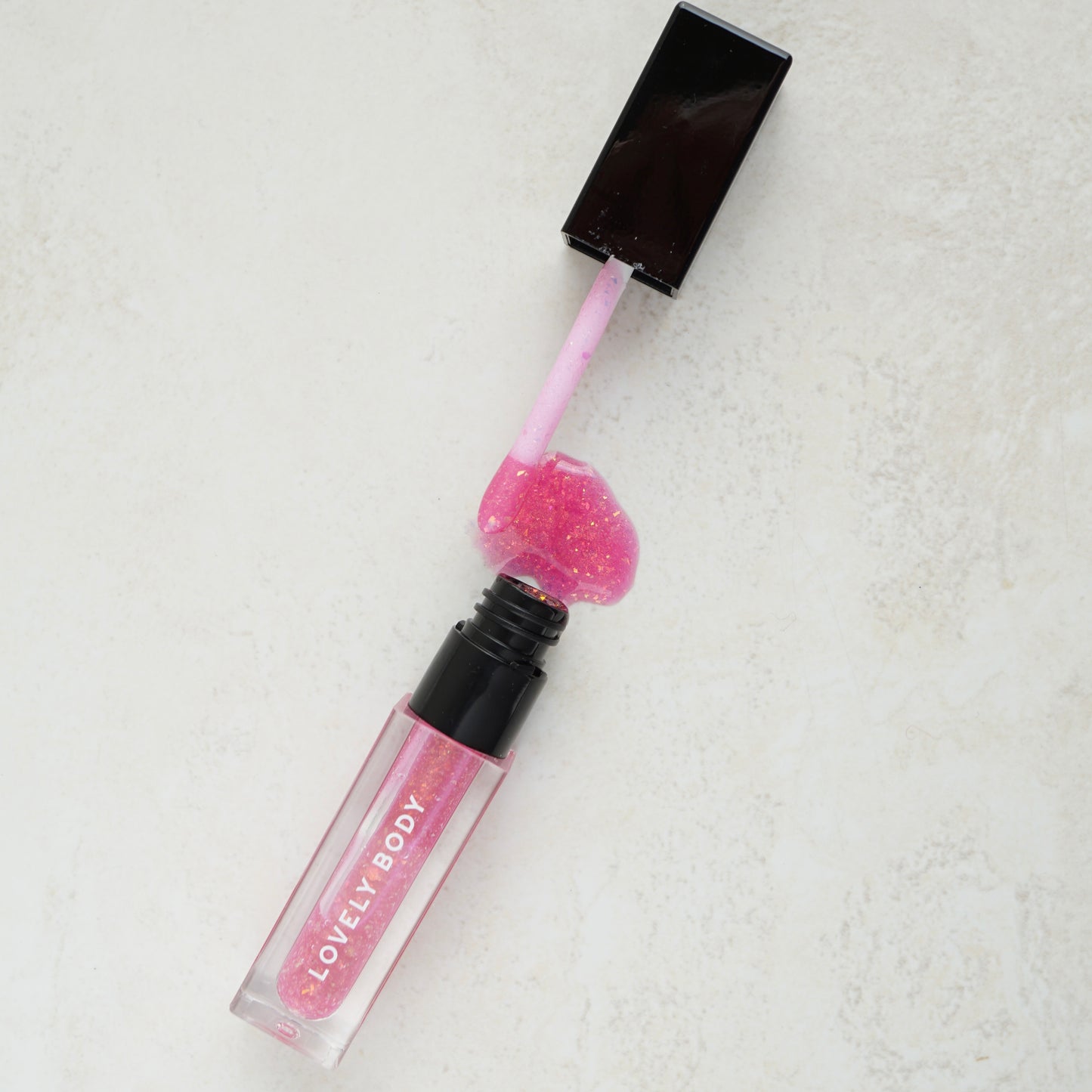 Pixie Punch Lip Gloss - Clear Pink with Iridescent Bio-Glitter