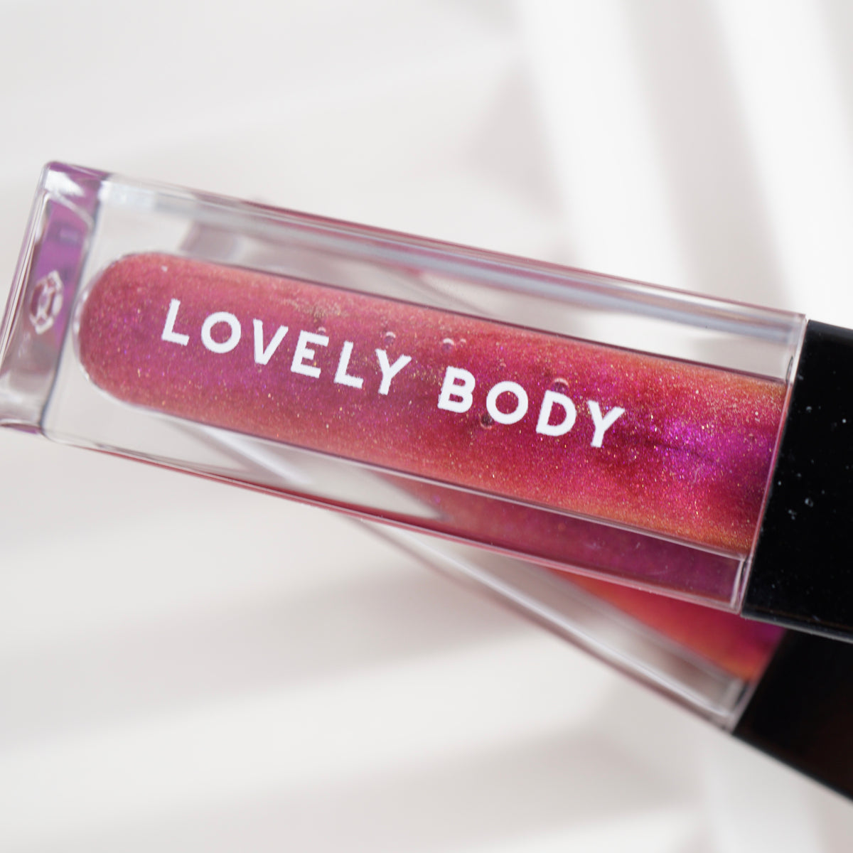 Bad Rose Lip Gloss - Sheer Violet Shine